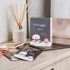 Emballage élégant My Beauty Diary, 8 masques perles noires prêts pour votre routine.