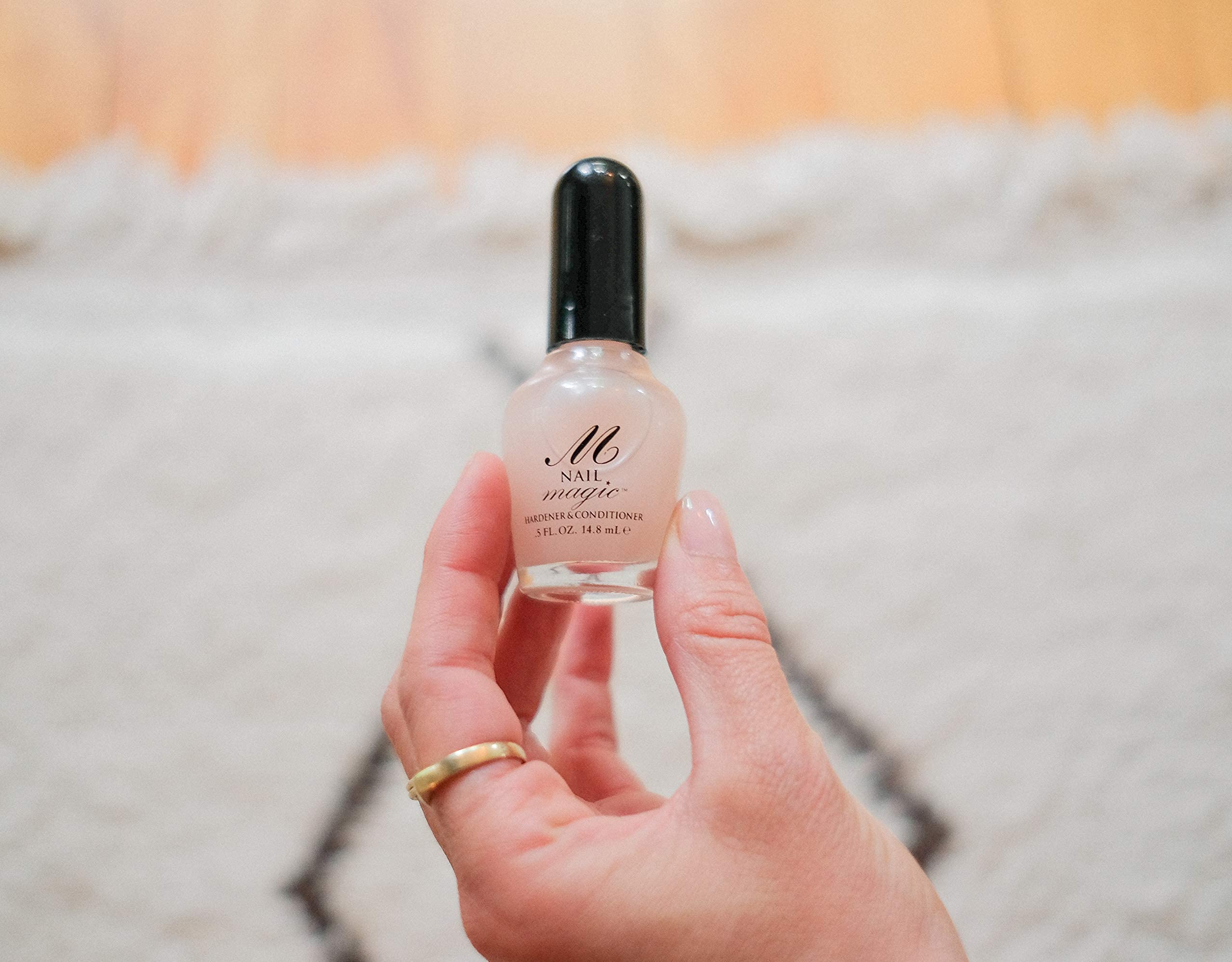 Couche-top Nail Magic pour une finition durable.