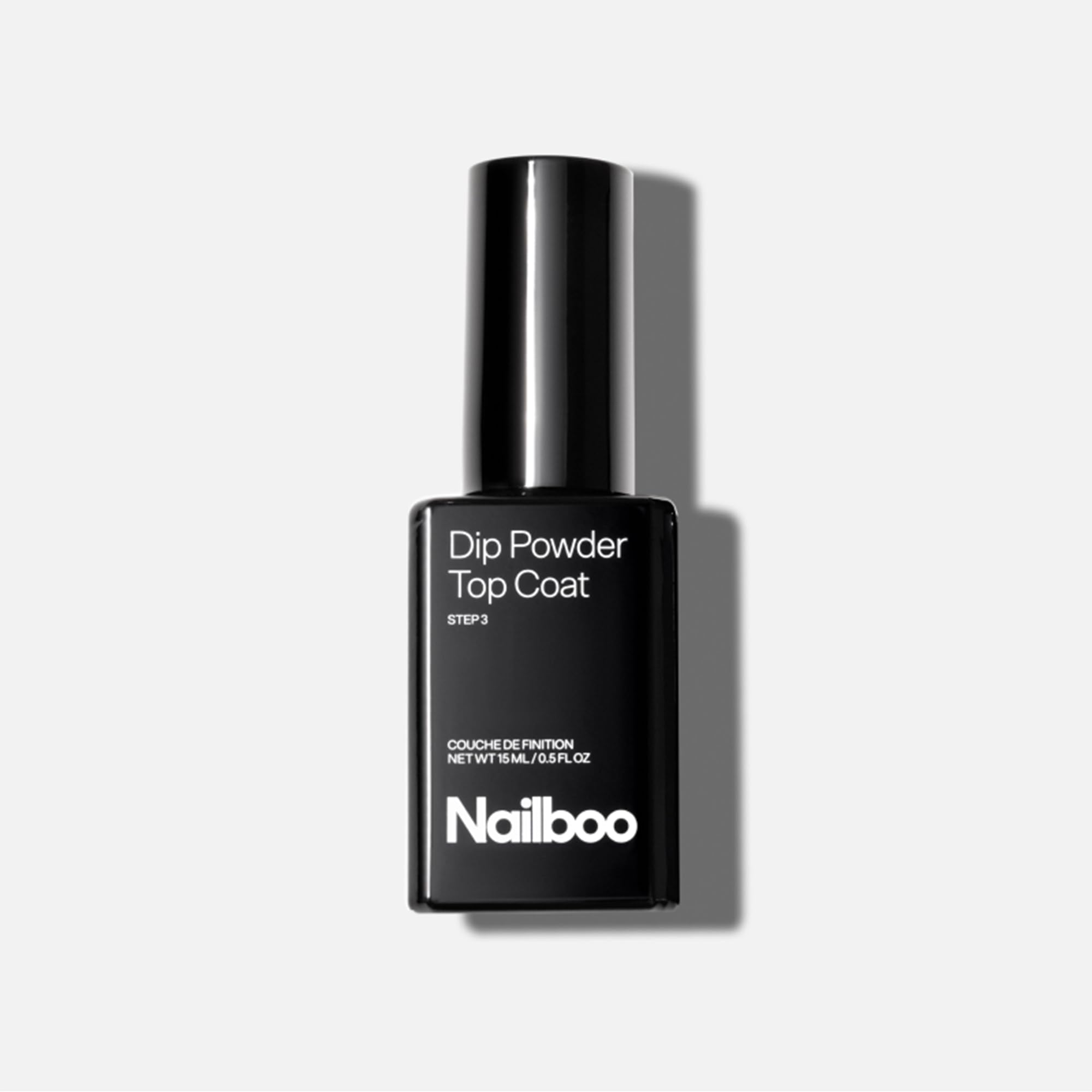 Nailboo Liquide Essentiel pour poudre de trempage : flacon prêt pour préparer l’application.