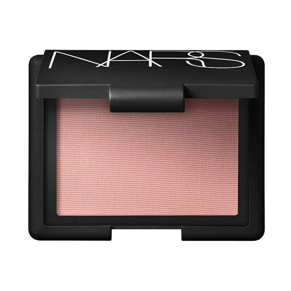 NARS Orgasm blush gros plan sur reflets dorés et nacres chaudes.