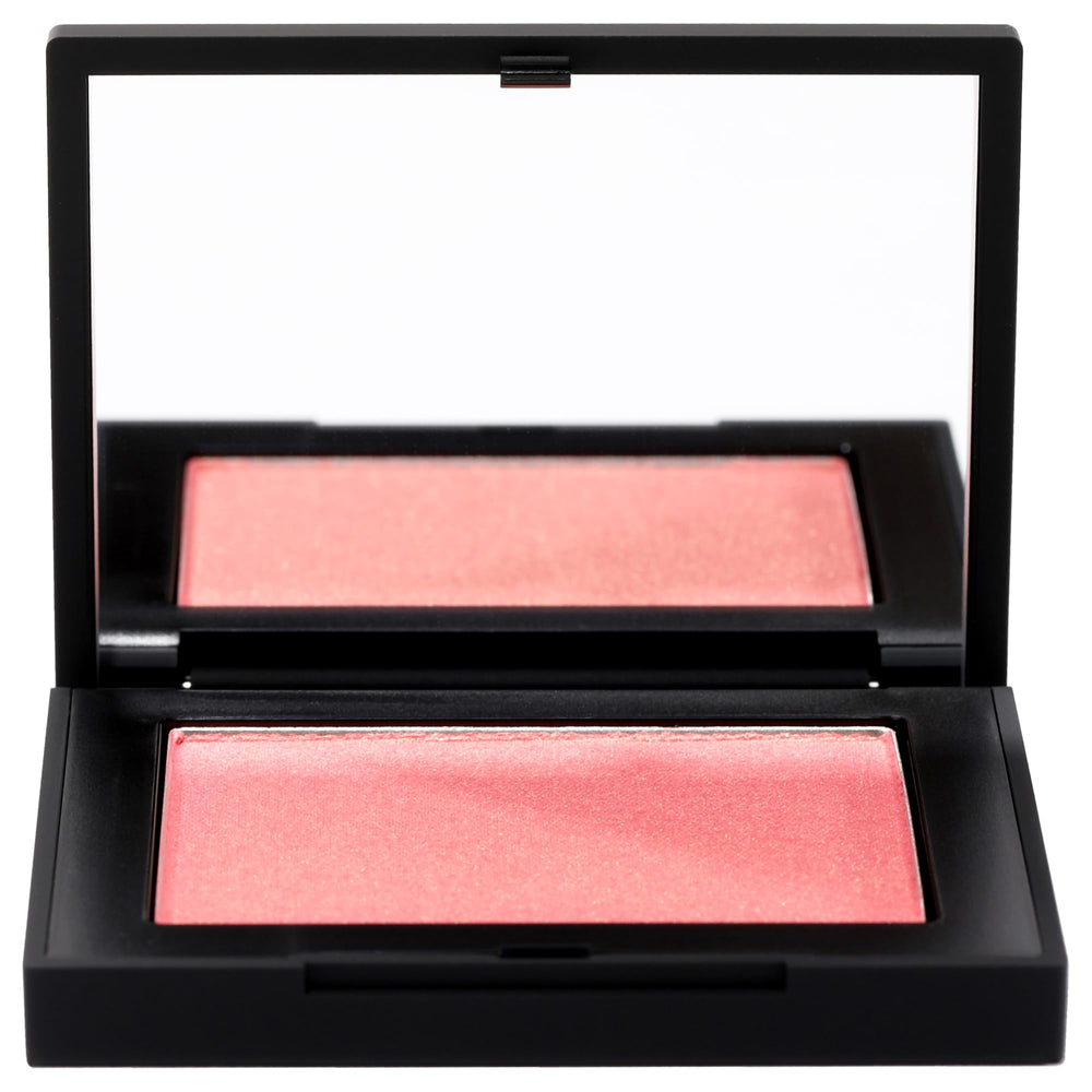 NARS Orgasm teinte pêche rosé, nuancée et lumineuse sur peau.
