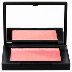 NARS Orgasm teinte pêche rosé, nuancée et lumineuse sur peau.