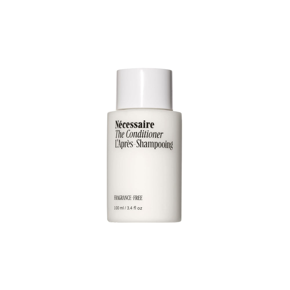 Nécessaire The Conditioner Mini – bouteille hyaluronique, démêlage doux et hydratant.