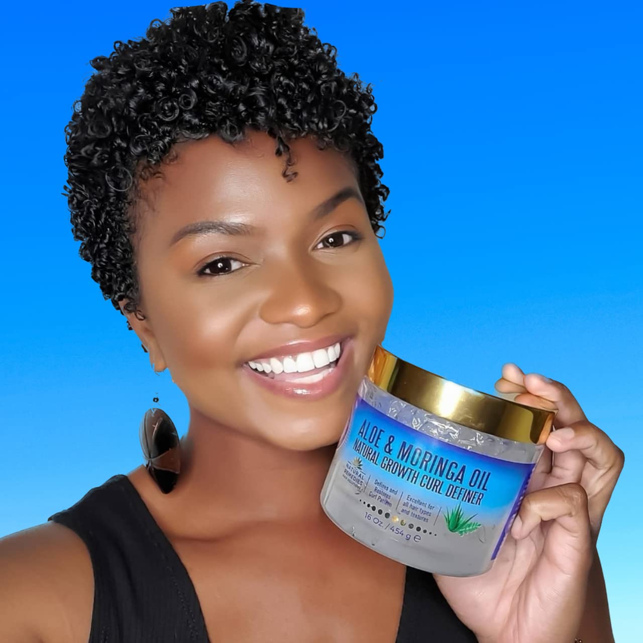 Nefertiti's Secrets – Utilisation sur cheveux humides puis diffusion pour des boucles définies.