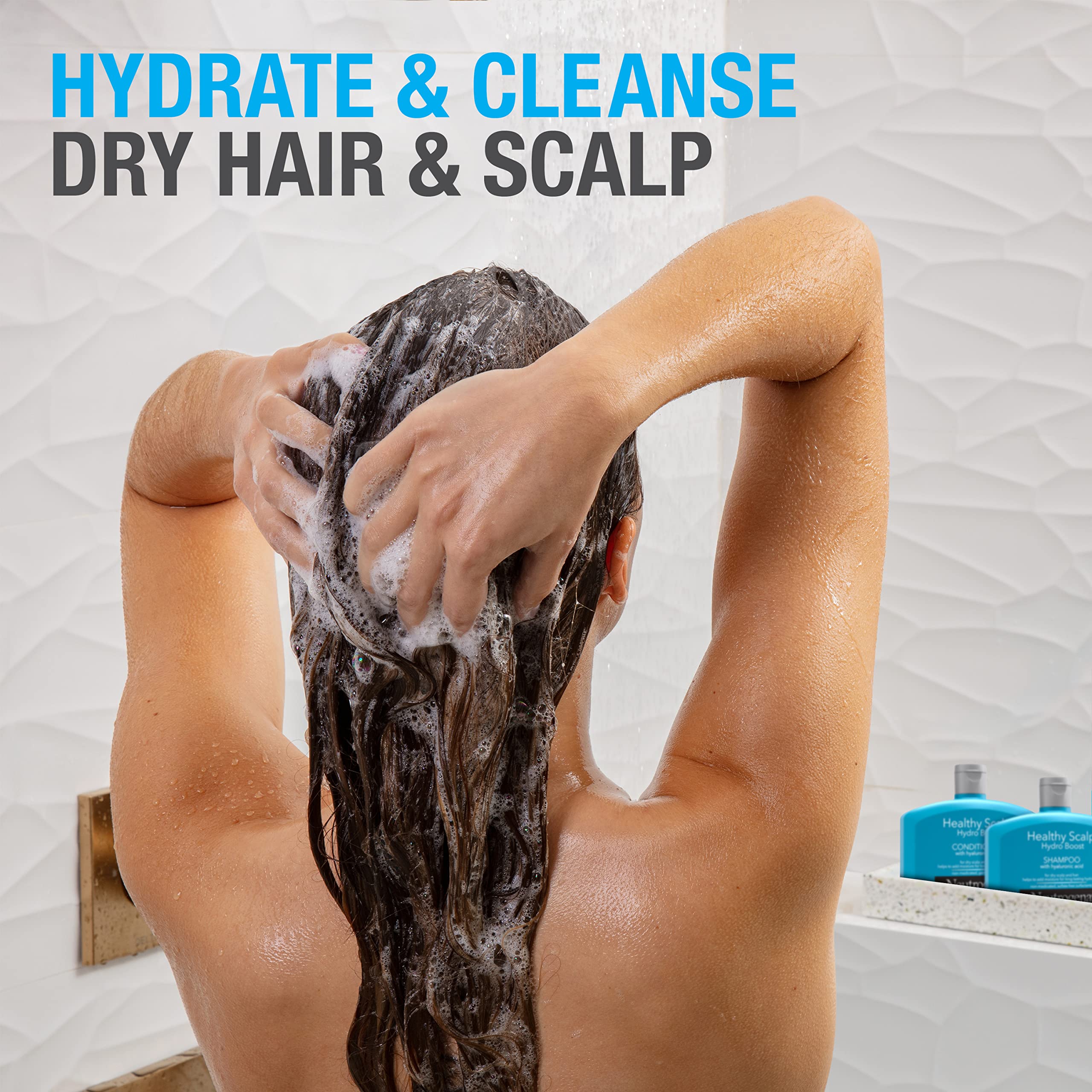 Shampoing Hydro Boost en action nettoyant les cheveux secs et sensibles.