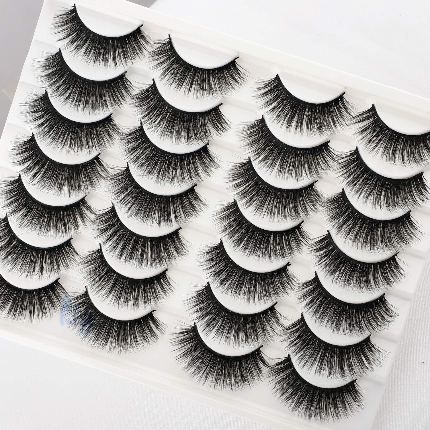 Newcally cils longs dramatiques — application facilitée par bande coton flexible.