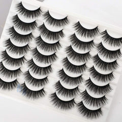 Newcally cils longs dramatiques — application facilitée par bande coton flexible.