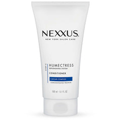 Nexxus Humectress bouteille hydratation durable pour cheveux secs.