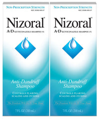 Shampoing anti-pelliculaire Nizoral A-D en bouteille bleue, action ciblée contre les pellicules.