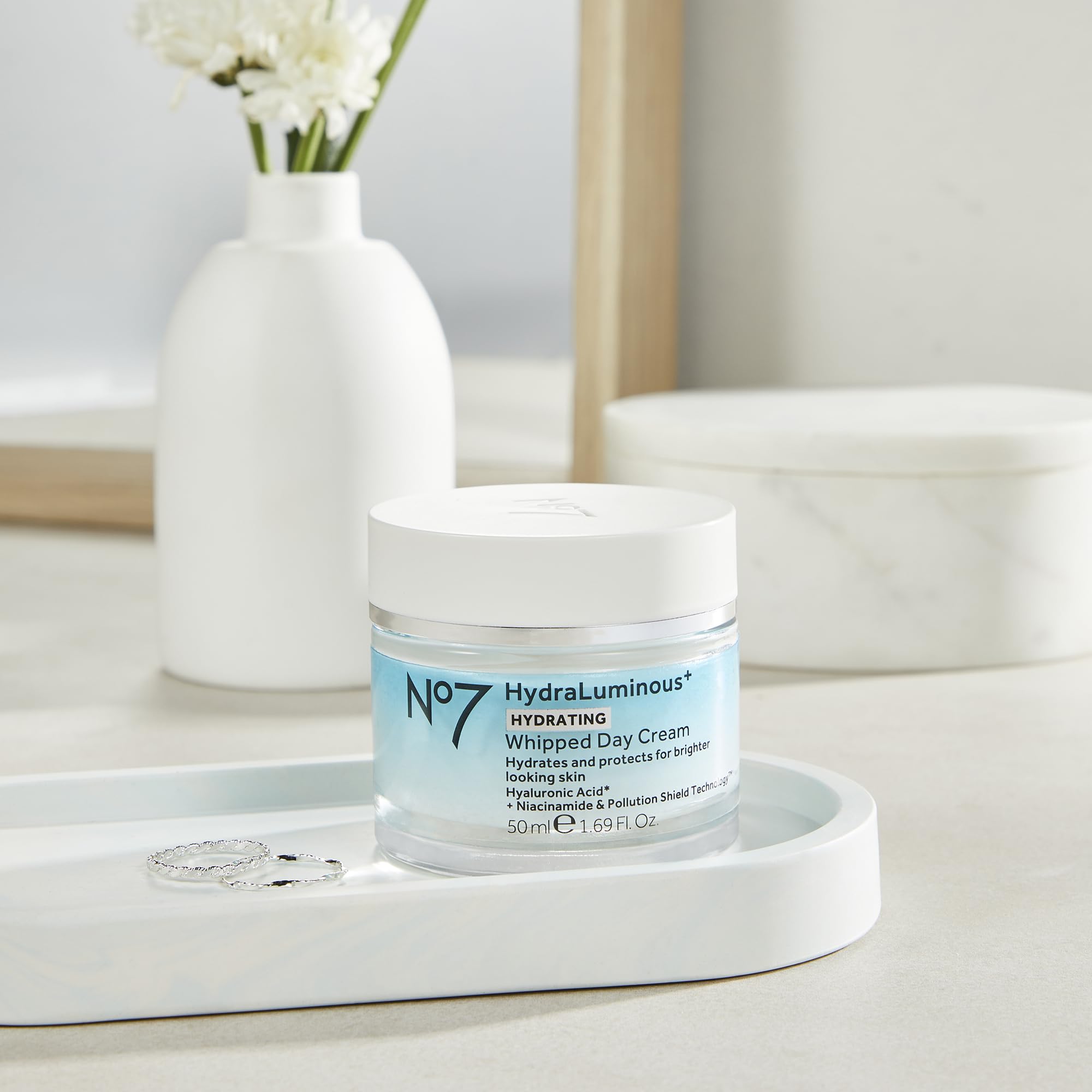 No7 HydraLuminous+ morning-application step on cleansed skin
