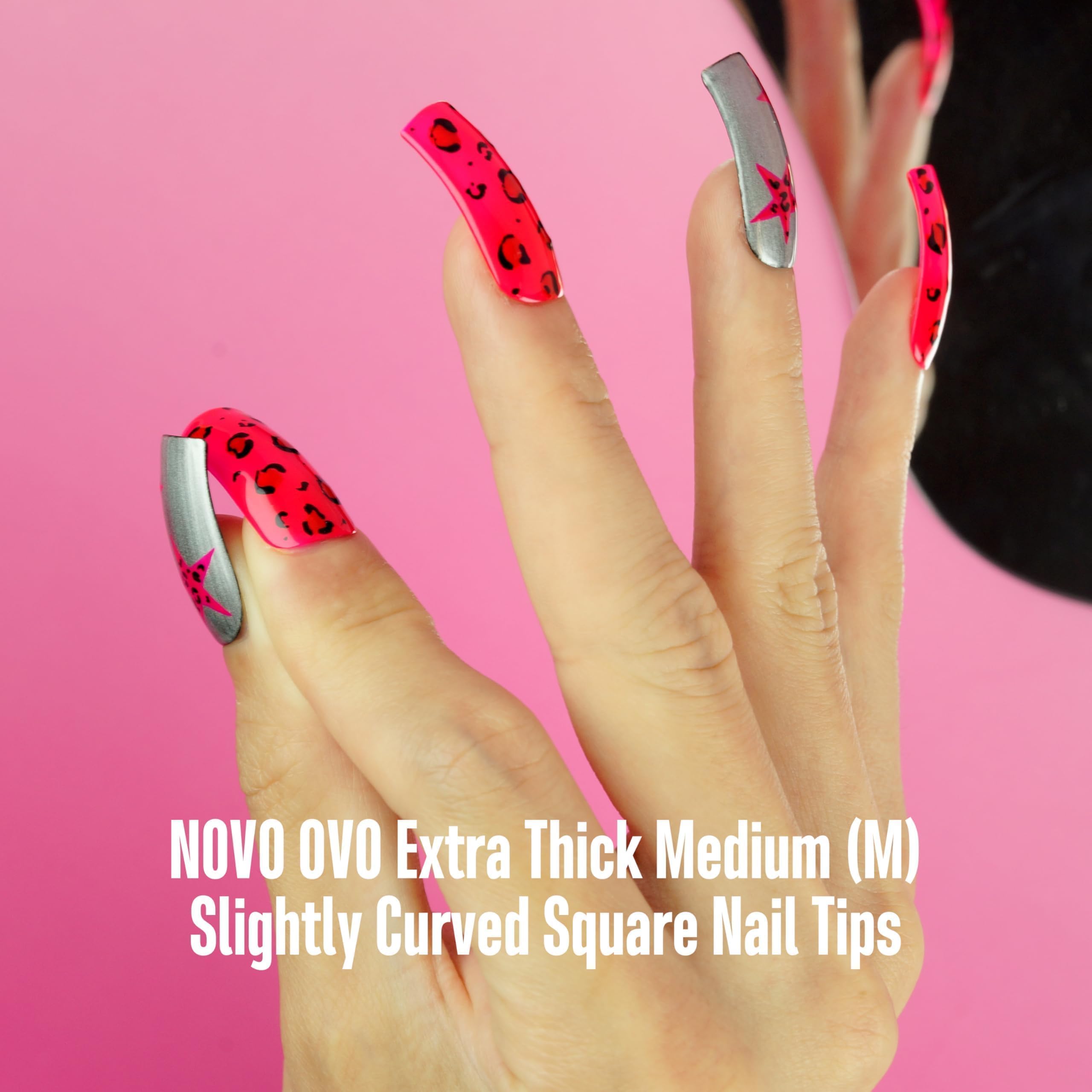 NOVO OVO 15-size pack of curved nail tips arranged for variety and fit.