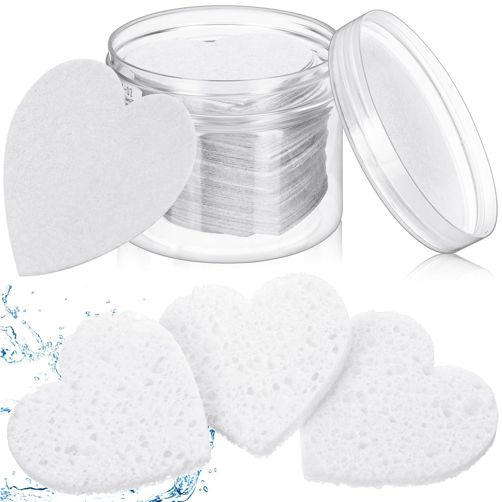 Éponges faciales Nuenen cœur dans le conteneur cylindrique, rangement pratique et hygiénique.