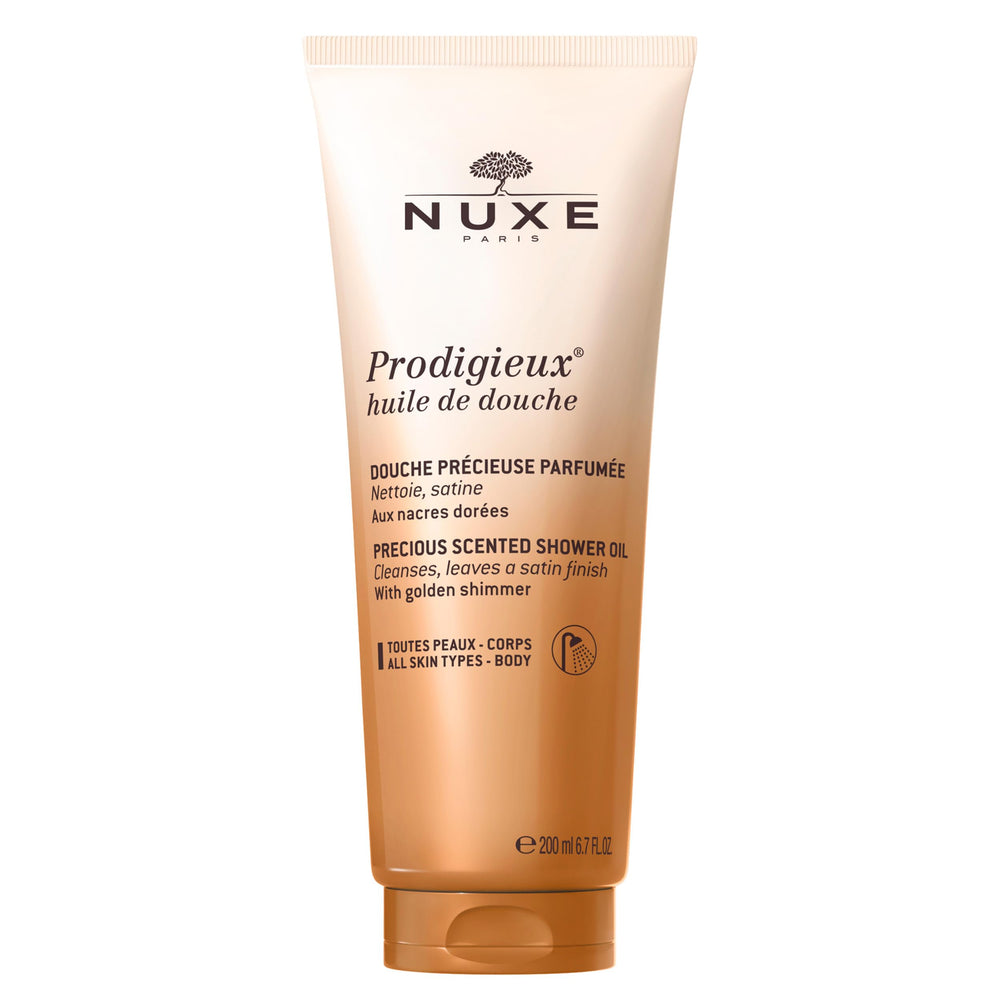 Nuxe Prodigieux gel douche vegan dans sa bouteille dorée, hydratant et parfumé pour la peau.