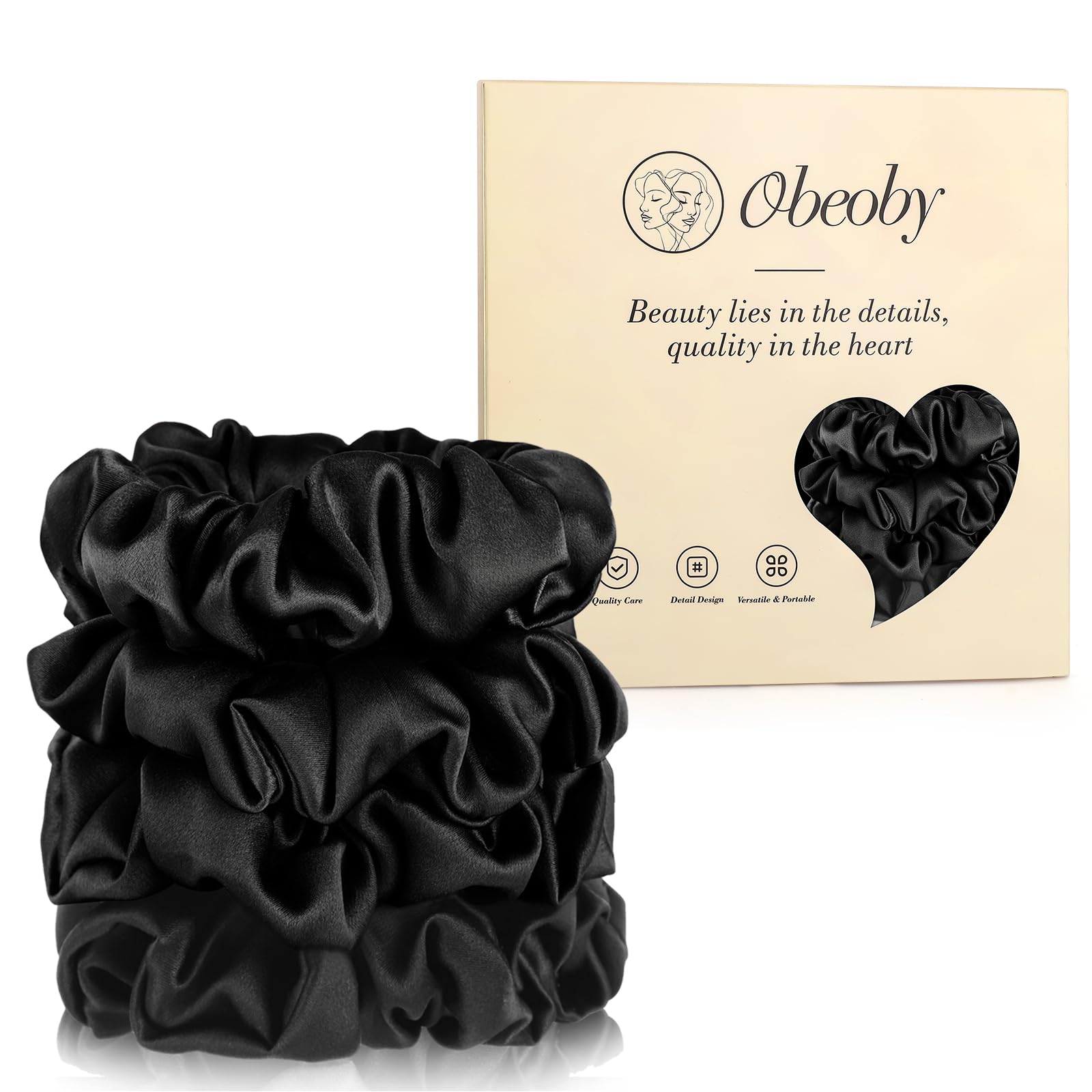 Chouchou obeoby en soie de mûrier noir, gros plan, douceur pour cheveux délicats.
