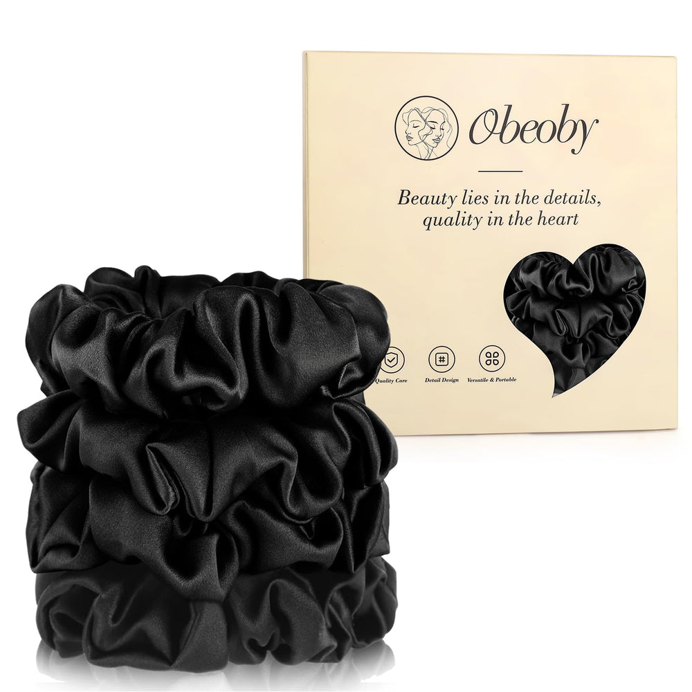 Chouchou obeoby en soie de mûrier noir, gros plan, douceur pour cheveux délicats.