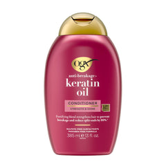OGX Anti-Casse: flacon de conditionneur à la kératine et huile d’argan.