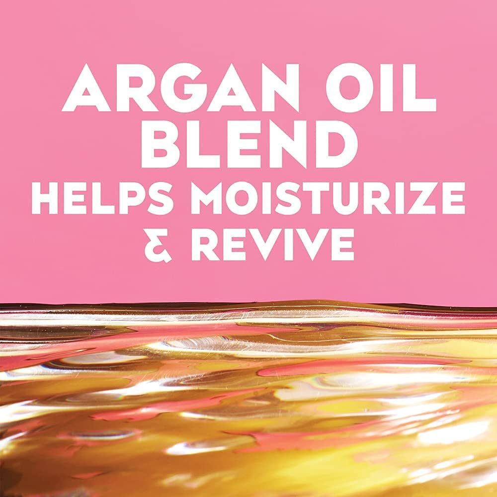 OGX anti-frizz huile coco aide à lisser et protéger.