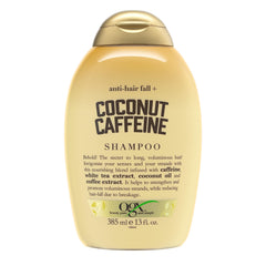 OGX Anti-Hair Fall Coconut Caffeine Shampoo bottle highlights caffeine blend for stronger strands.