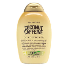 OGX Anti-Chute Caféine Coco — bouteille prête pour revitaliser les cheveux.