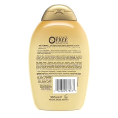 OGX Conditionneur Caféine Coco — texture crémeuse qui glisse sur les longueurs.