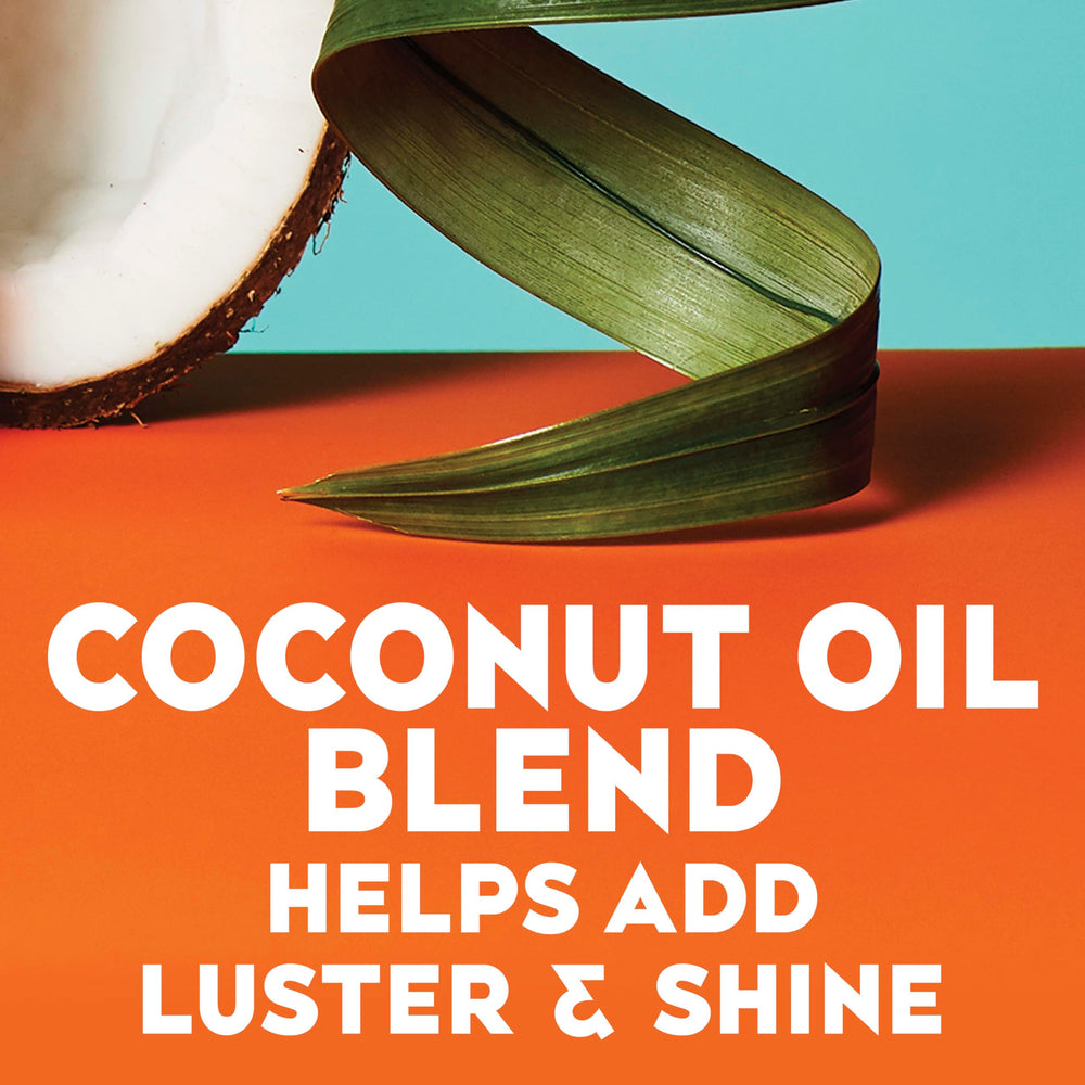 OGX Quenching Coconut Curls texture creme contre les frisottis.