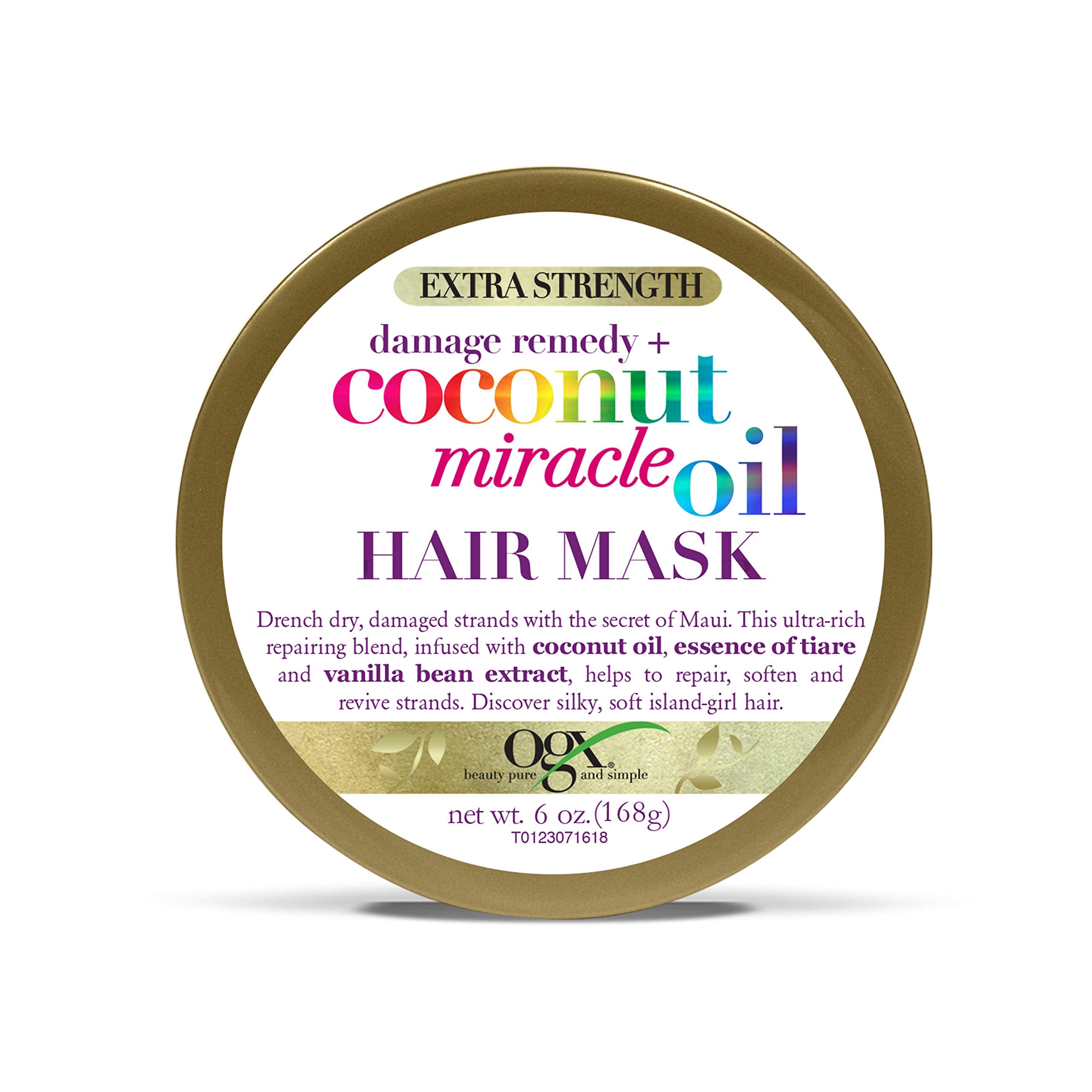 OGX Remède anti-dommages masque coco-cheveux épais pour douceur et réparation.