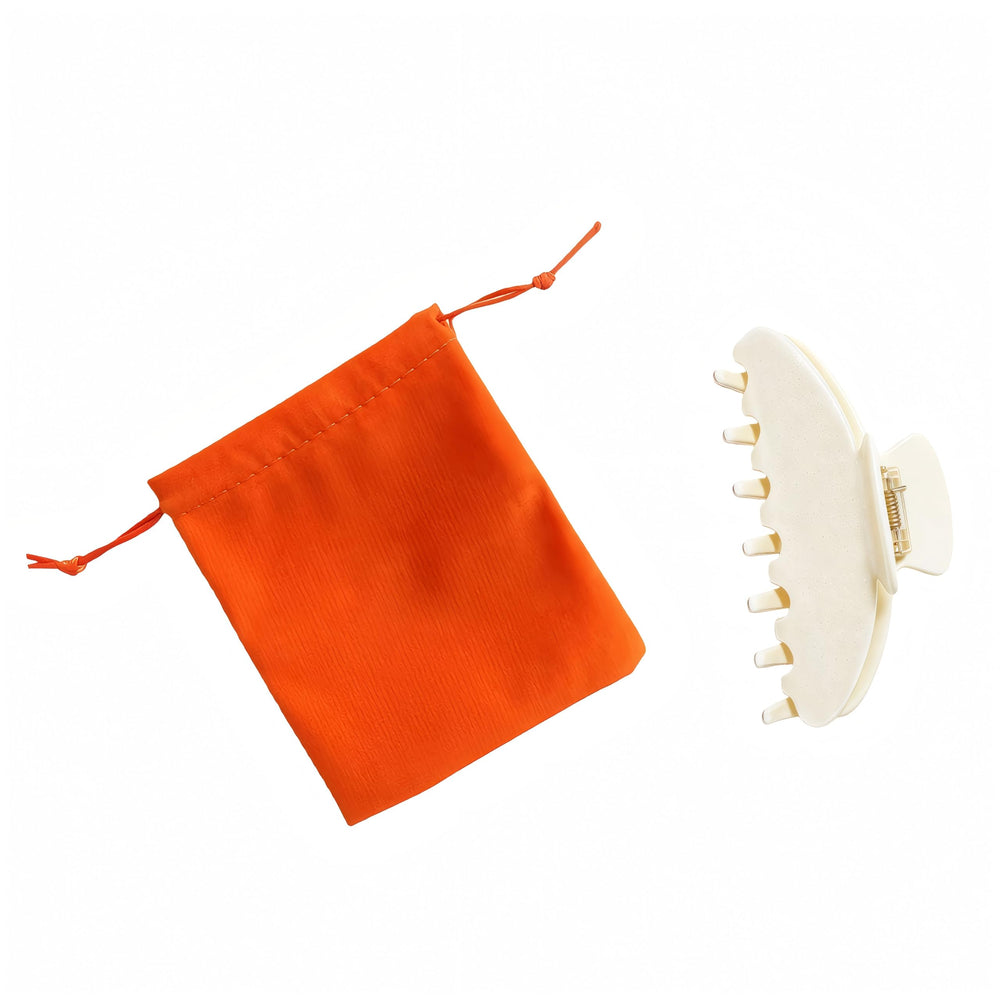 Grip anti-glisse des pinces OideGuiing assurant un maintien ferme sans abîmer les cheveux.