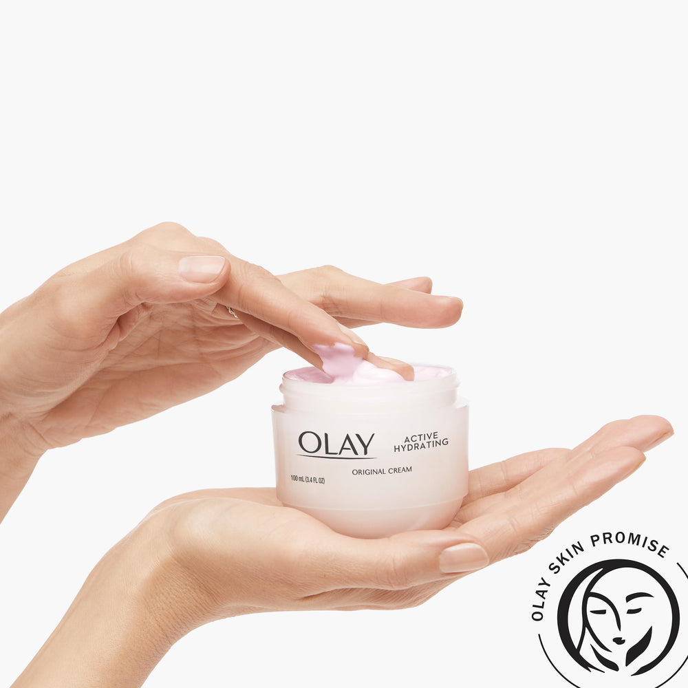 Olay Active Hydrating Cream jar with soft lighting for premium look