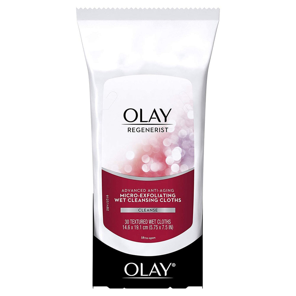 OLAY Regenerist travel-friendly wipes beside a makeup bag show portability