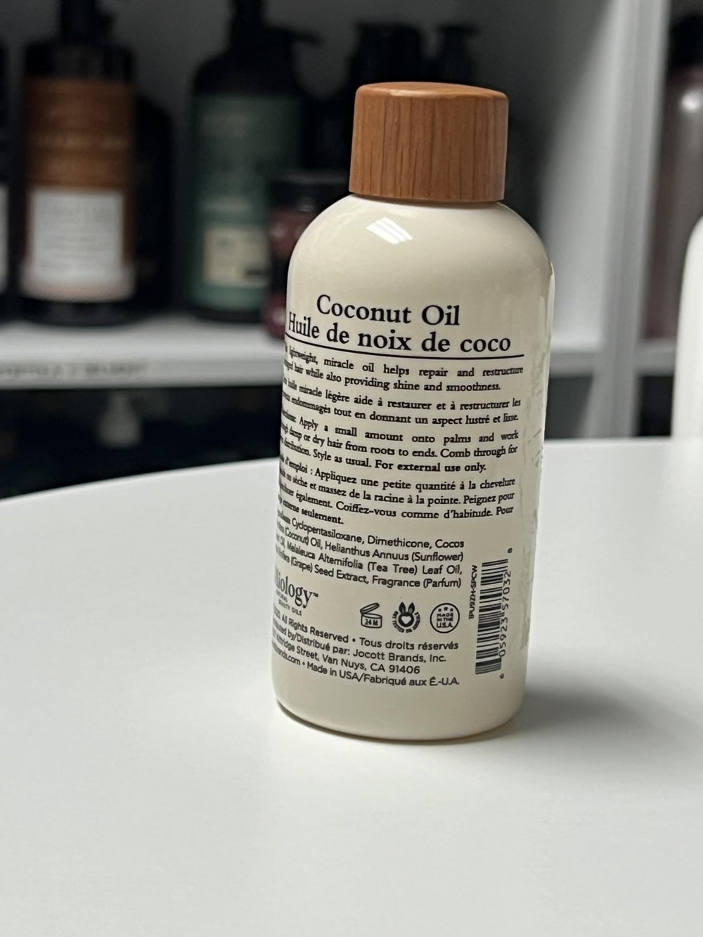 Oliology huile cheveux coco — texture légère dompte les frisottis