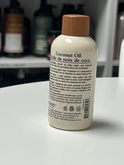 Oliology huile cheveux coco — texture légère dompte les frisottis