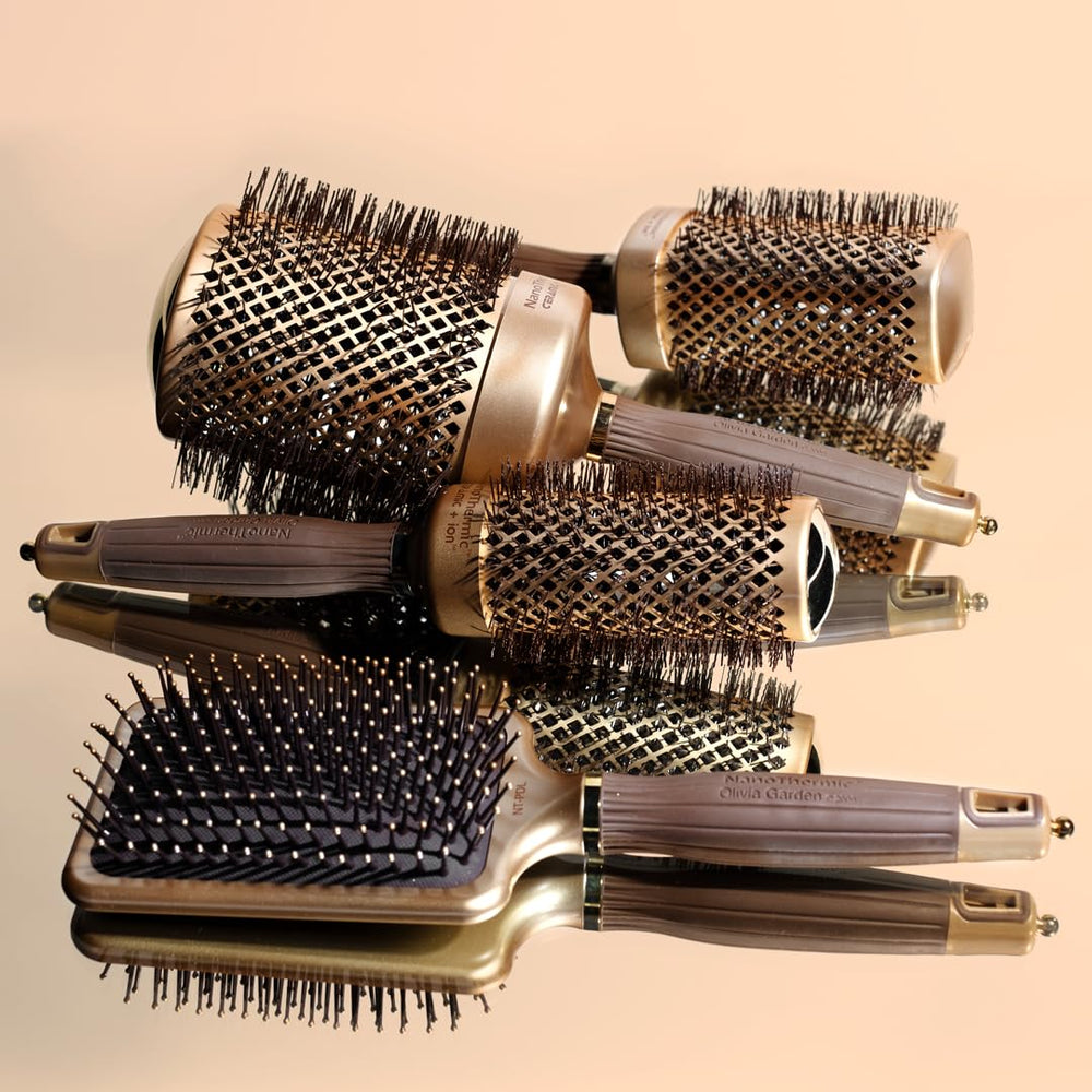Brosse Olivia Garden NT-PDL Paddle - coussinet ionique pour confort du cuir chevelu.