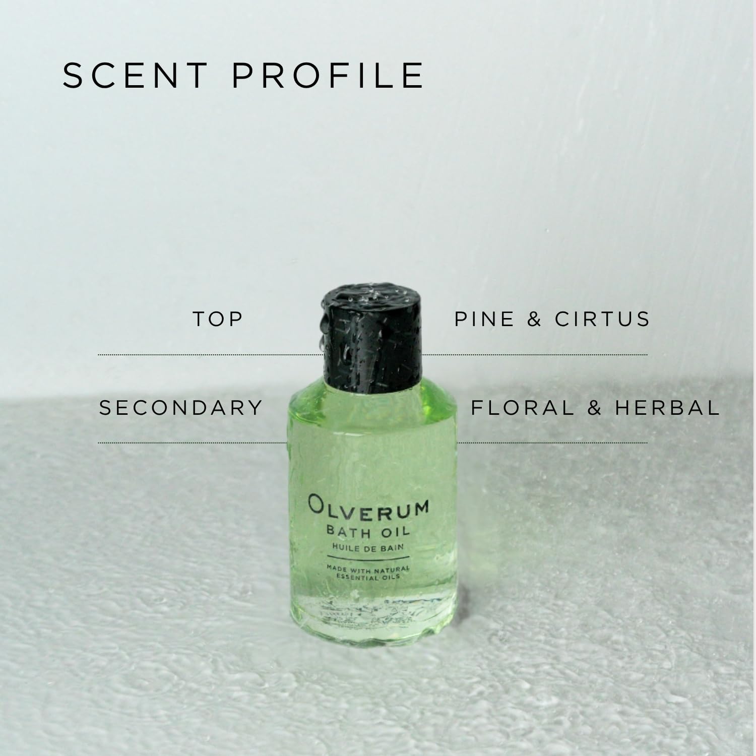 Application Olverum huile-bain sur peau, pour une douceur satinée.