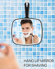 Miroir OMIRO noir, forme rectangulaire arrondie, design moderne et élégant.