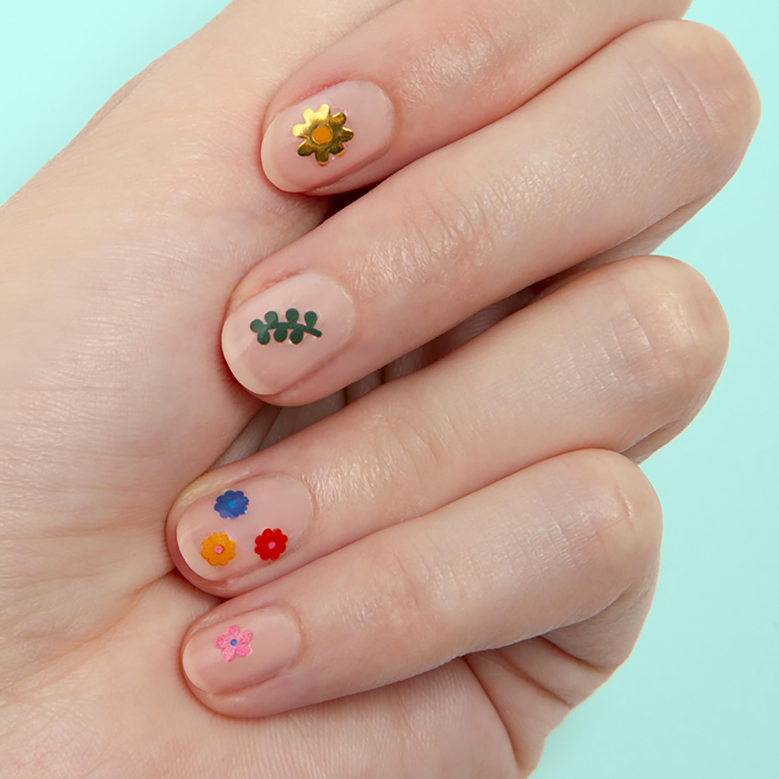 Omy Fleurs : motifs variés et colorés pour fêtes et cadeaux.