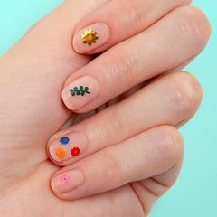 Omy Fleurs : motifs variés et colorés pour fêtes et cadeaux.