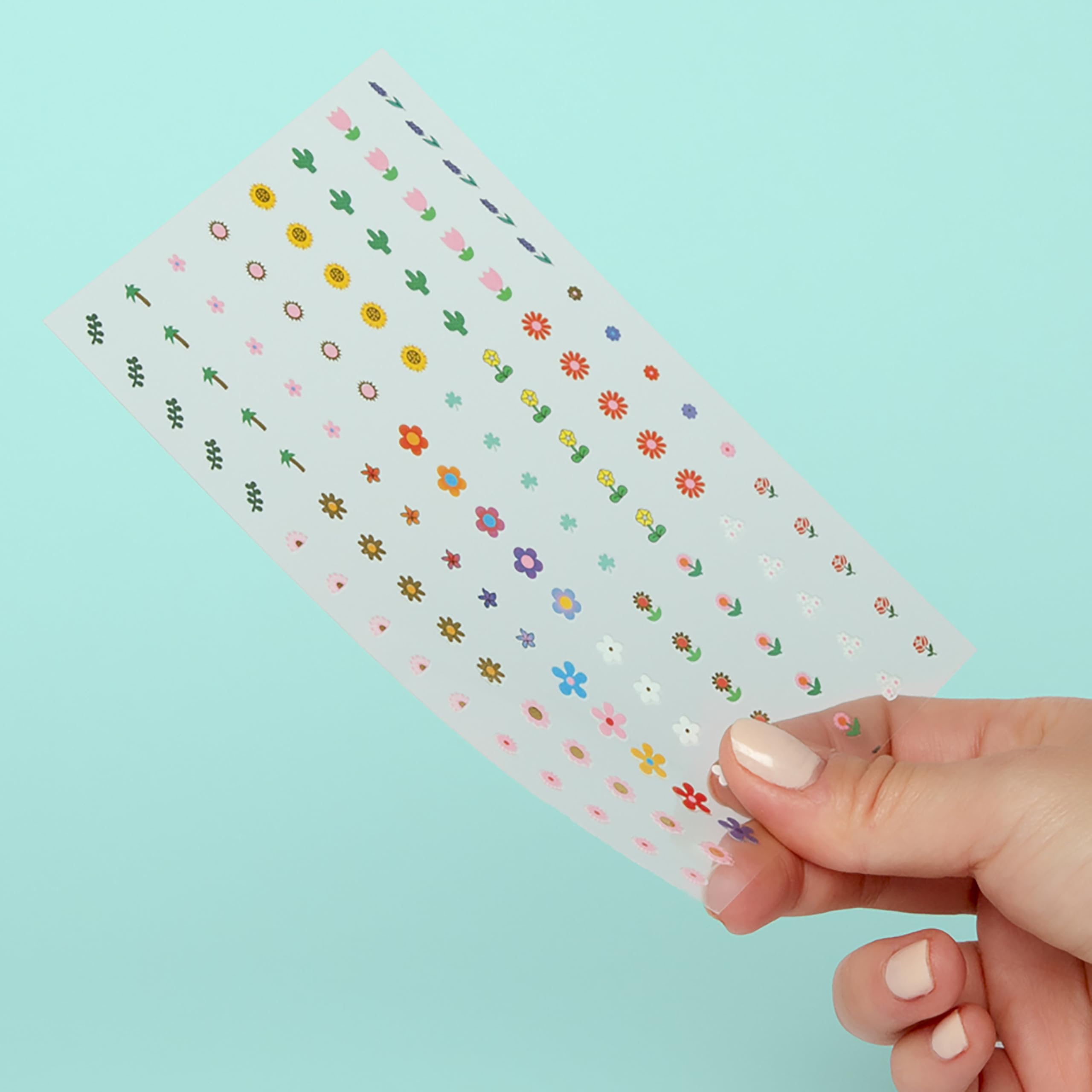 Omy Fleurs, stickers brillants et imperméables pour activités quotidiennes.