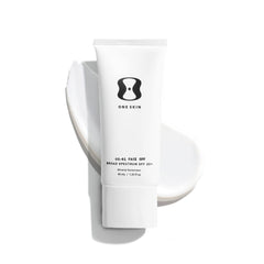 OneSkin FACE SPF OS-01, bouteille minérale, protection solaire efficace et propre.