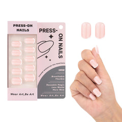 Ongles à poser blancs avec bout blanc et forme carrée, application douce.