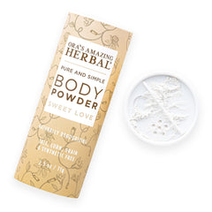 Poudre Ora's Amazing Herbal dans sa bouteille, parfum chaleureux pour la peau.