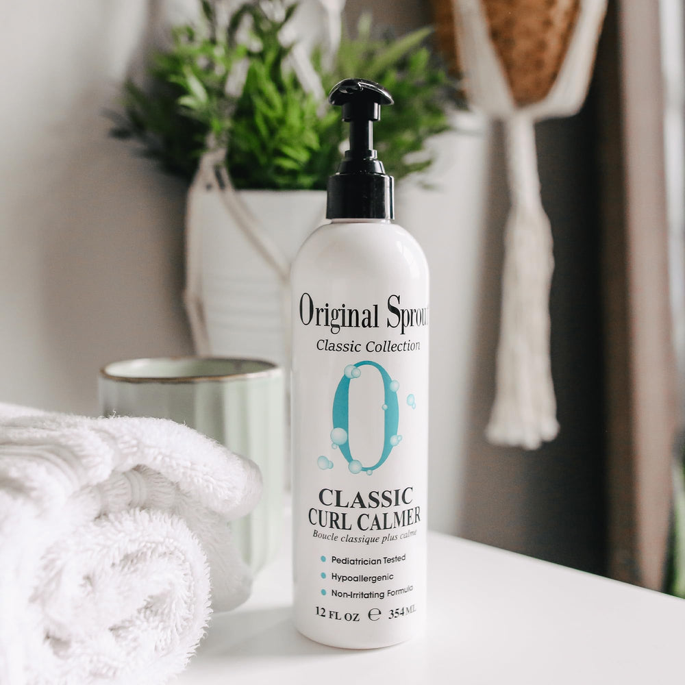 Texture crème fine du Curl Calmer prête à hydrater les boucles.