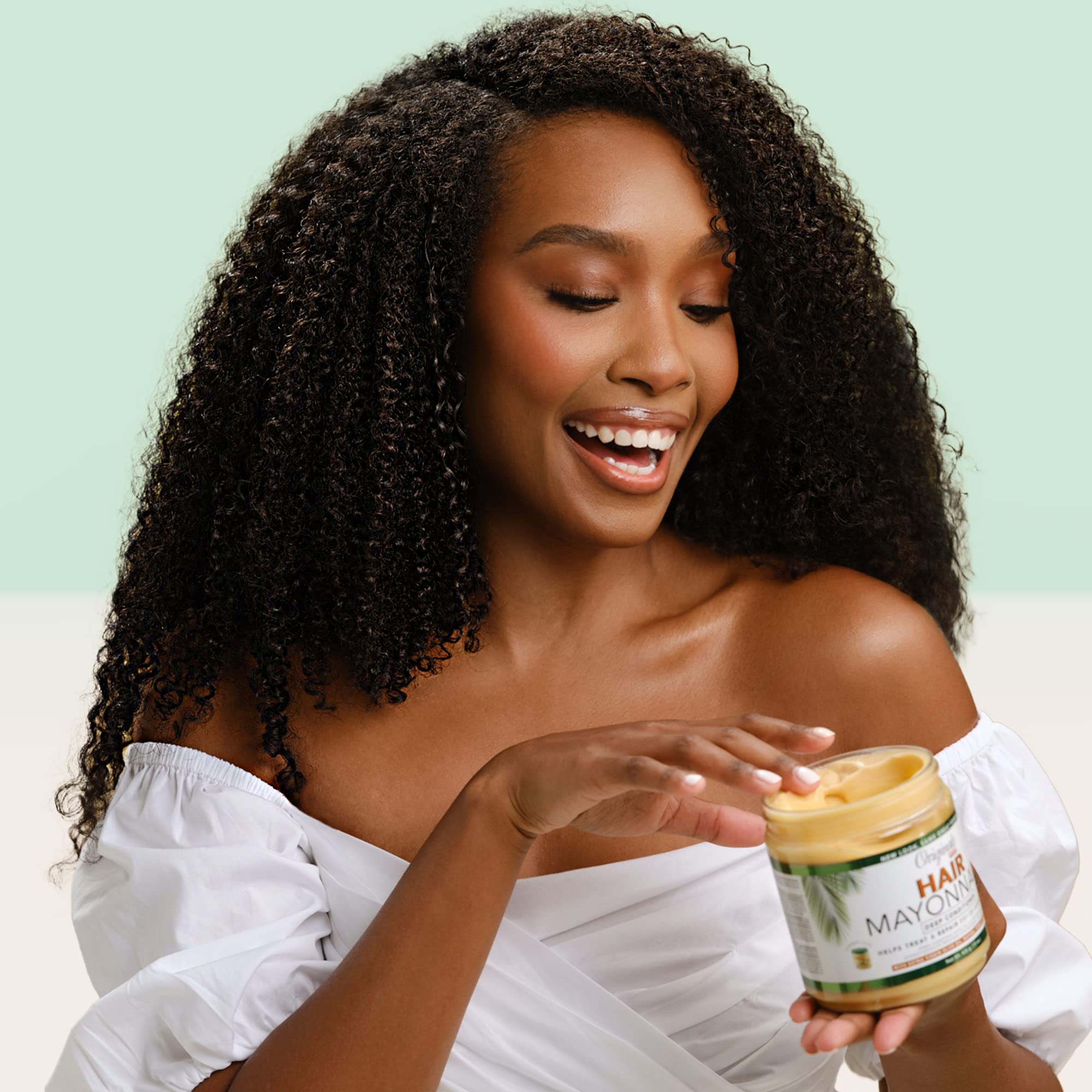 Elastique accrue des cheveux grâce au soin profond d'Originals by Africa's Best