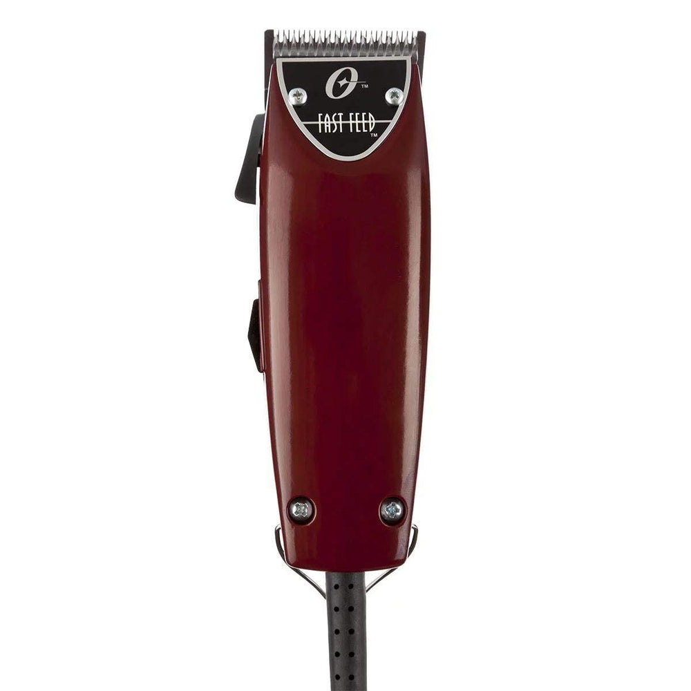 Oster Fast Feed pare-lame avec huile et brosse de nettoyage.