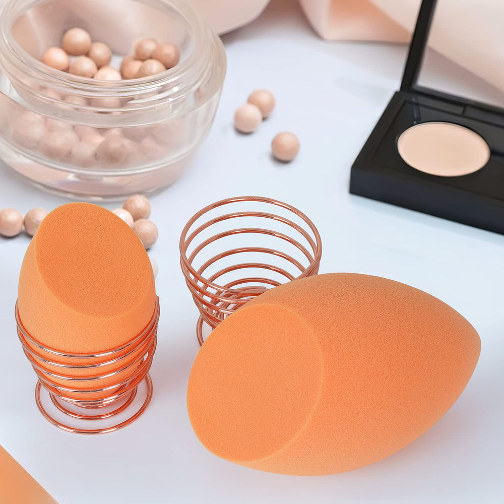 Éponge OtNiap XL utilisée sur les contours du visage pour précision.