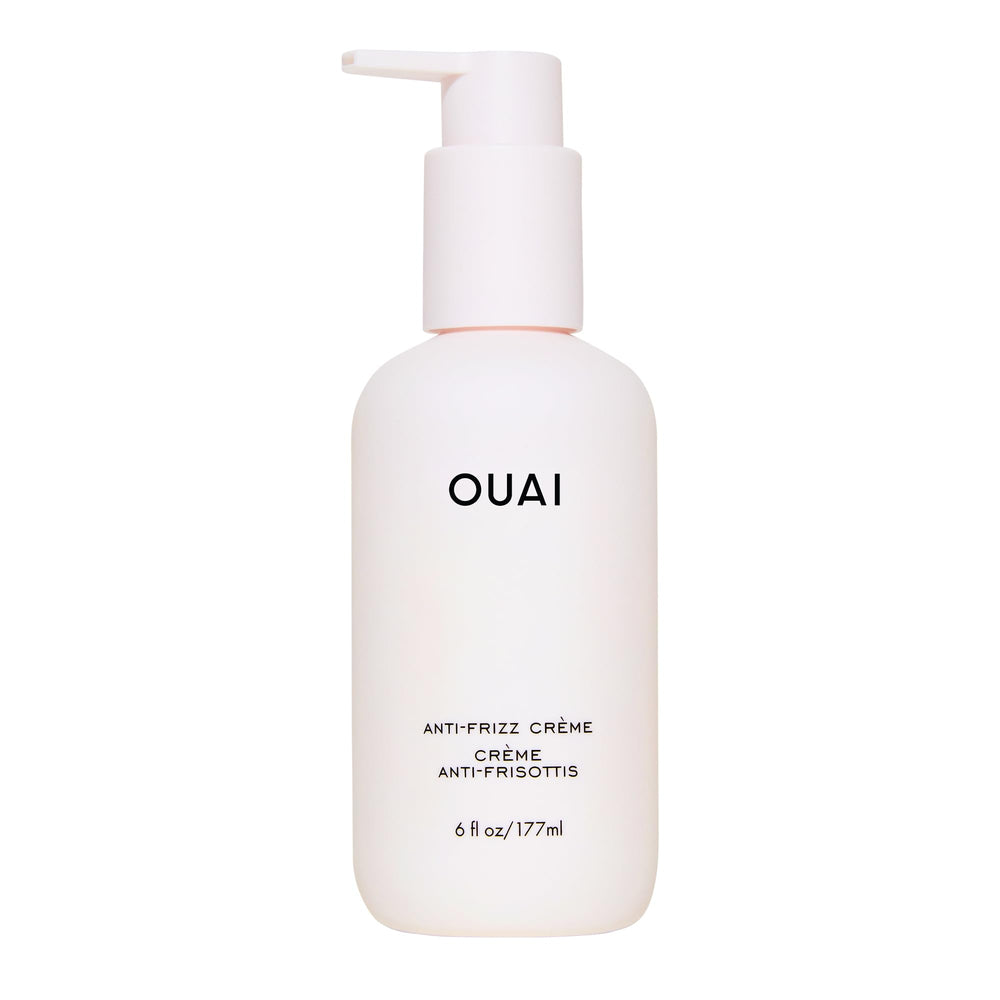Crème OUAI Anti-Frizz dans sa bouteille, hydratation durable et contrôle des frisottis.