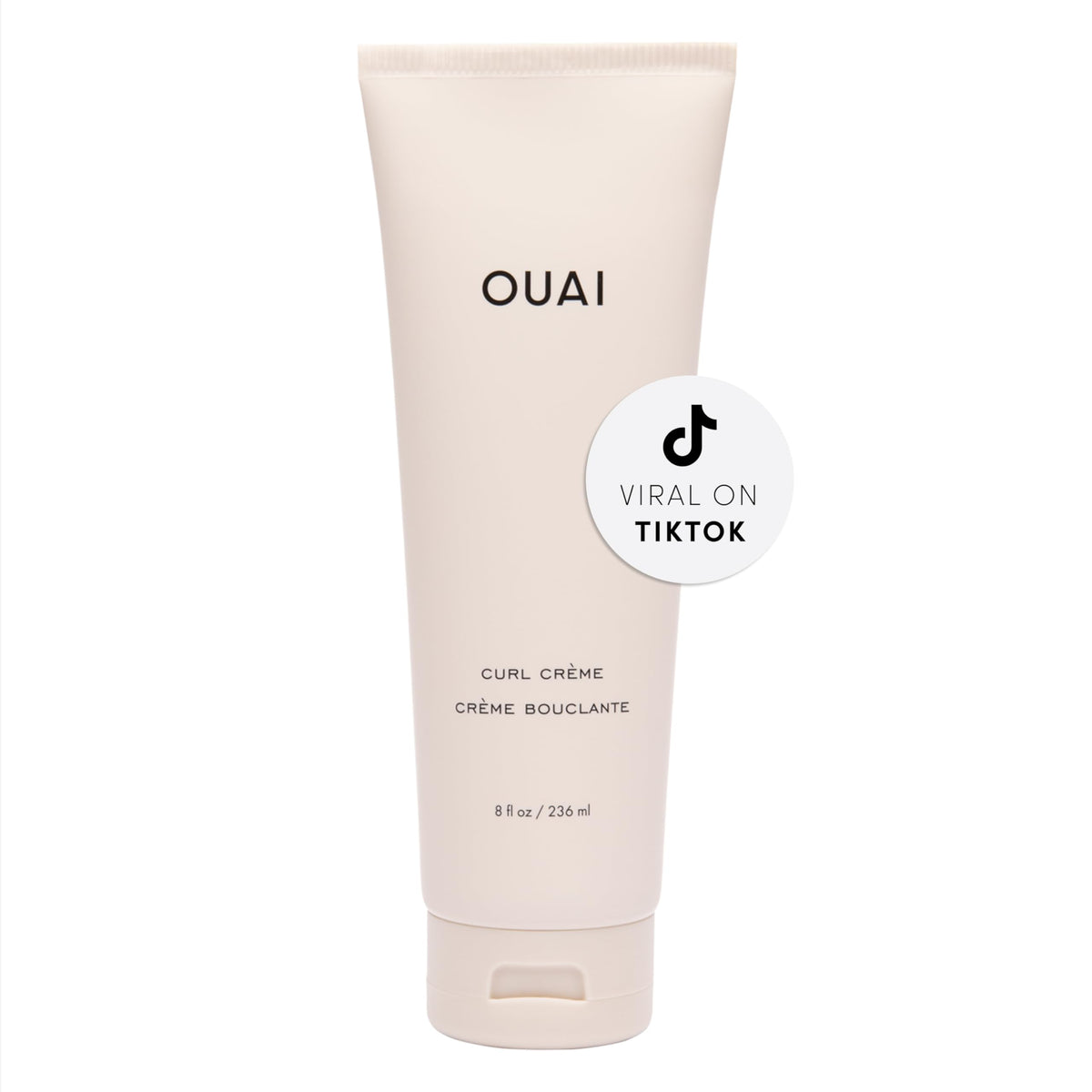 OUAI Curl Cream – bouteille montrée pour une définition nette des boucles et brillance naturelle.