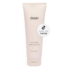 OUAI Curl Cream – bouteille montrée pour une définition nette des boucles et brillance naturelle.