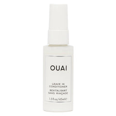 OUAI démelant spray bouteille démontrant démêlage rapide et facile