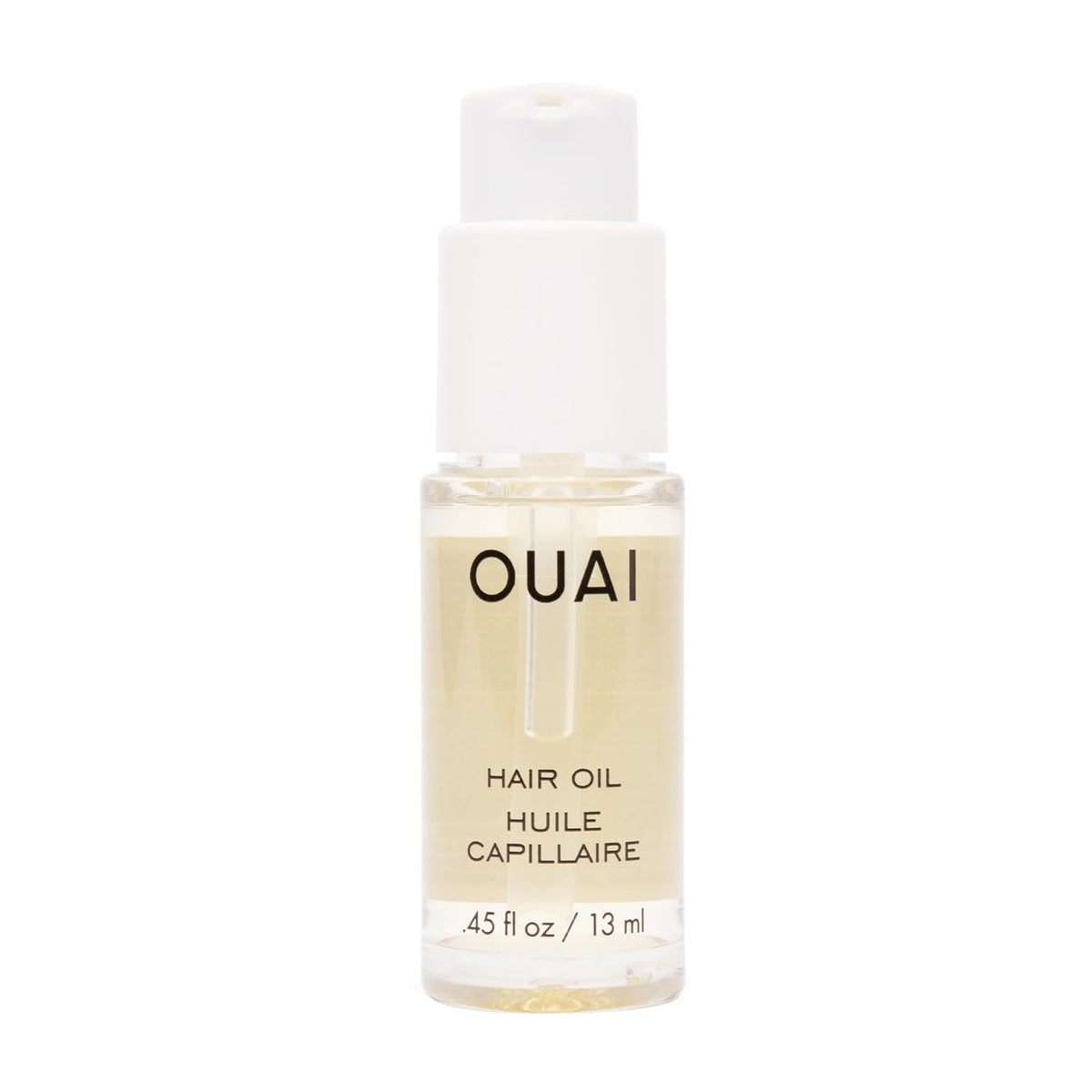 OUAI Huile Cheveux voyage: bouteille compacte prête pour la protection de la couleur lors des déplacements.