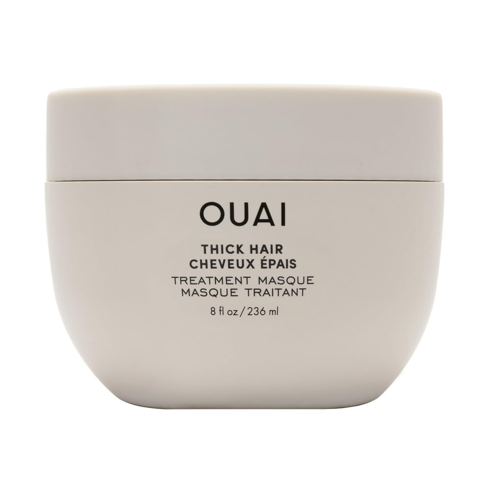 OUAI Masque Cheveux Épais – bouteille du produit, nourrissement profond pour cheveux cassants.
